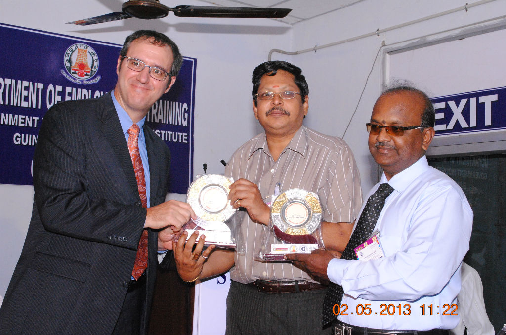 Public Affairs Officer, American Consulate Chennai David J Gainer giving Mementoes to Ramasamy and Kathiresan from Computer Society of India