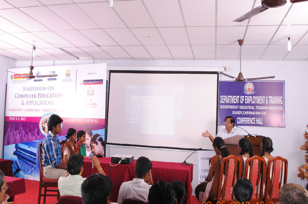 Computer Society of India Vice President H.R. Mohan conducting Final round of Quiz Competition