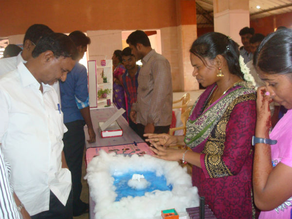 Student Explaining her Project to Chief Guest